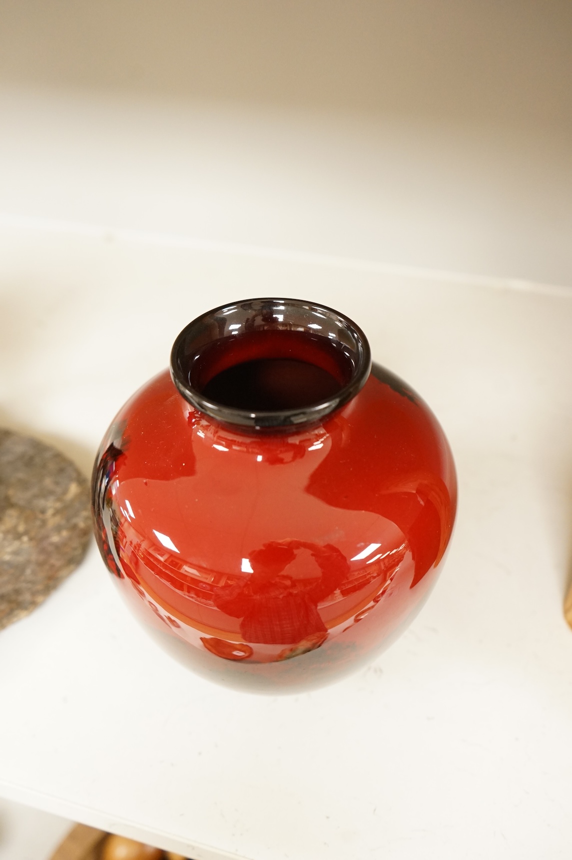 A Royal Doulton flambé vase decorated with a landscape, 19cm high